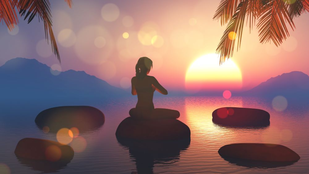 Meditation on a round stone in the pink mist