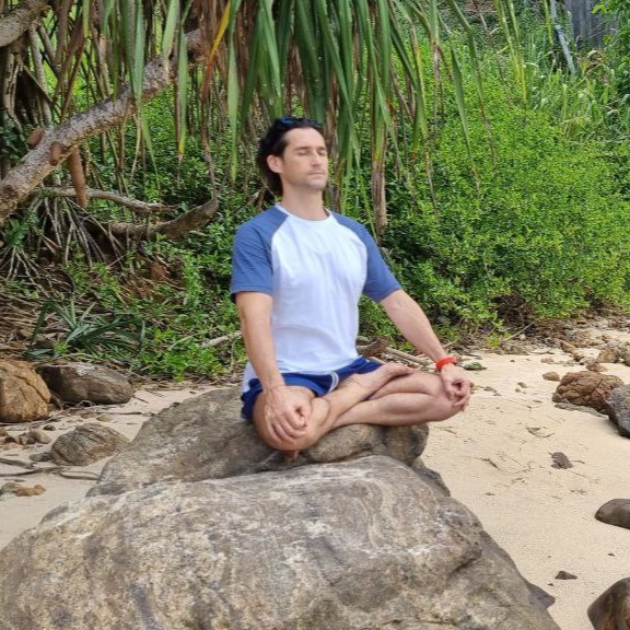 Photo of Roman meditating